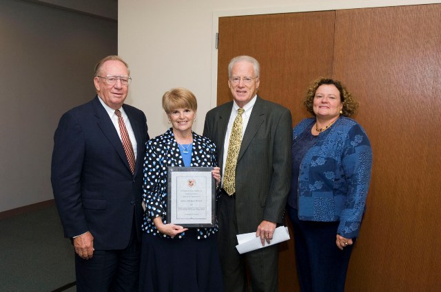 From left: USM Board of Regents Chairman Clifford M. Kendall, Marylane McGlinchey, Chancellor William E. "Brit" Kirwan and SU President Janet Dudley Eshbach.