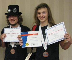 Vestal and Brown (right) wearing their bronze medals