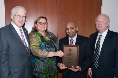 Dr. Leonard Arvi (second from right)
