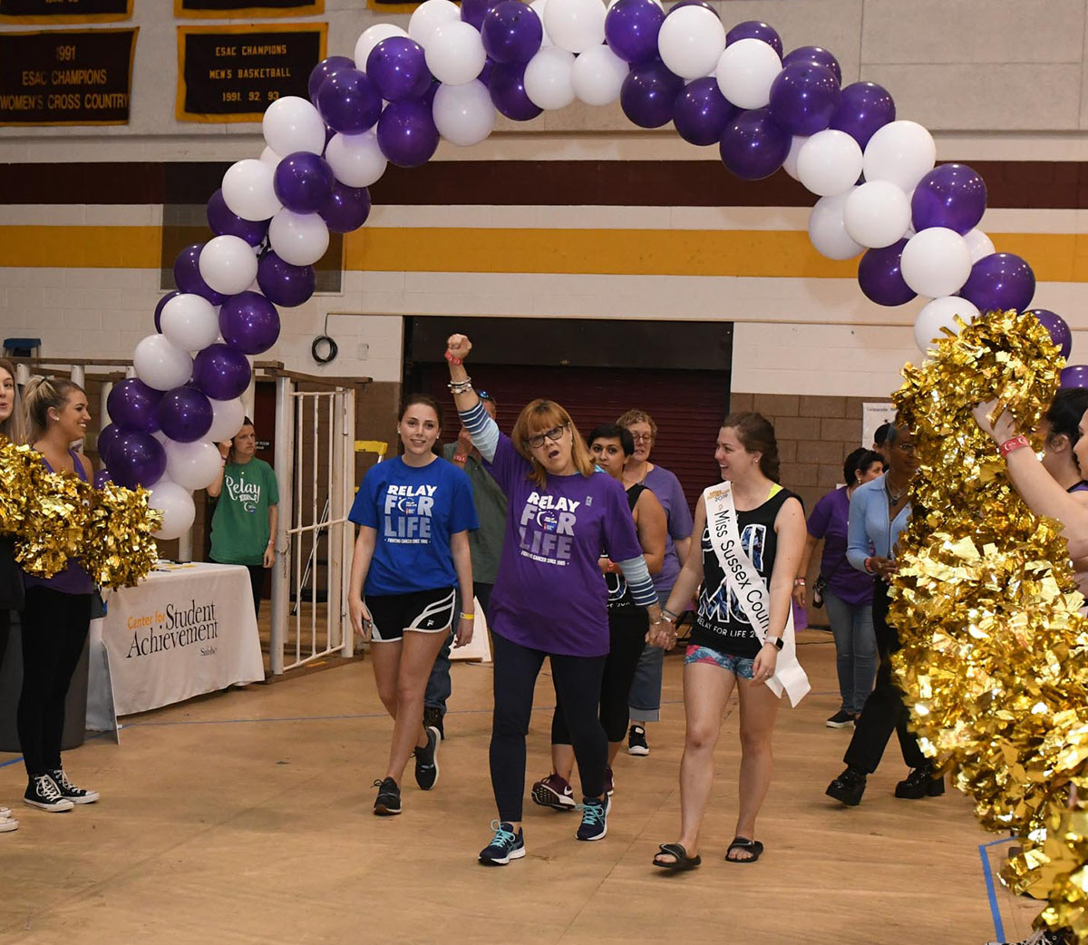 Survivors lead the first lap during the 2019 SU Relay For Life