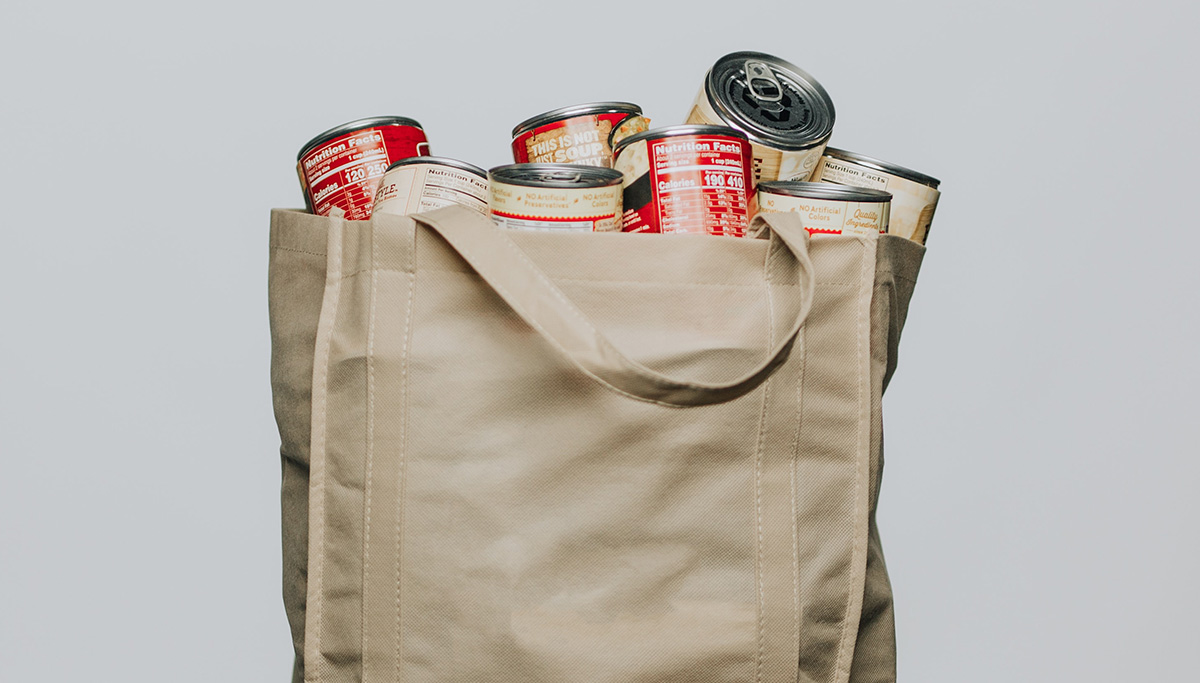 canvas bag filled with canned goods