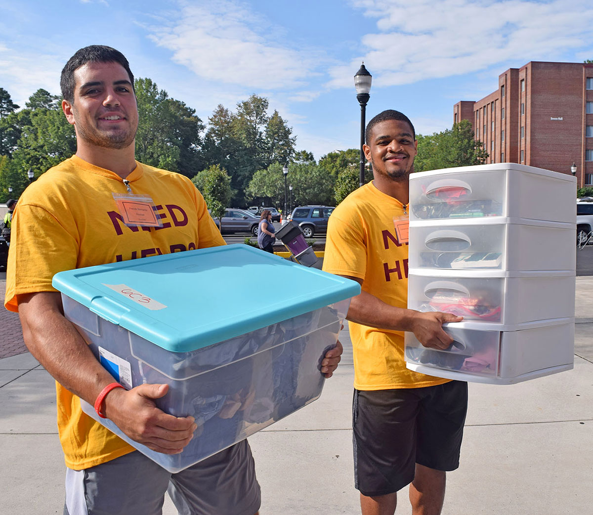 Students moving boxes