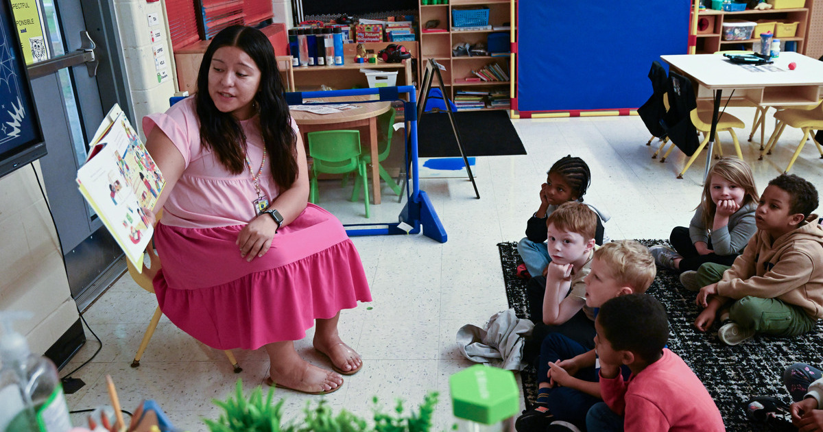 Adela reads to her classroom at Princess Anne Elementary School