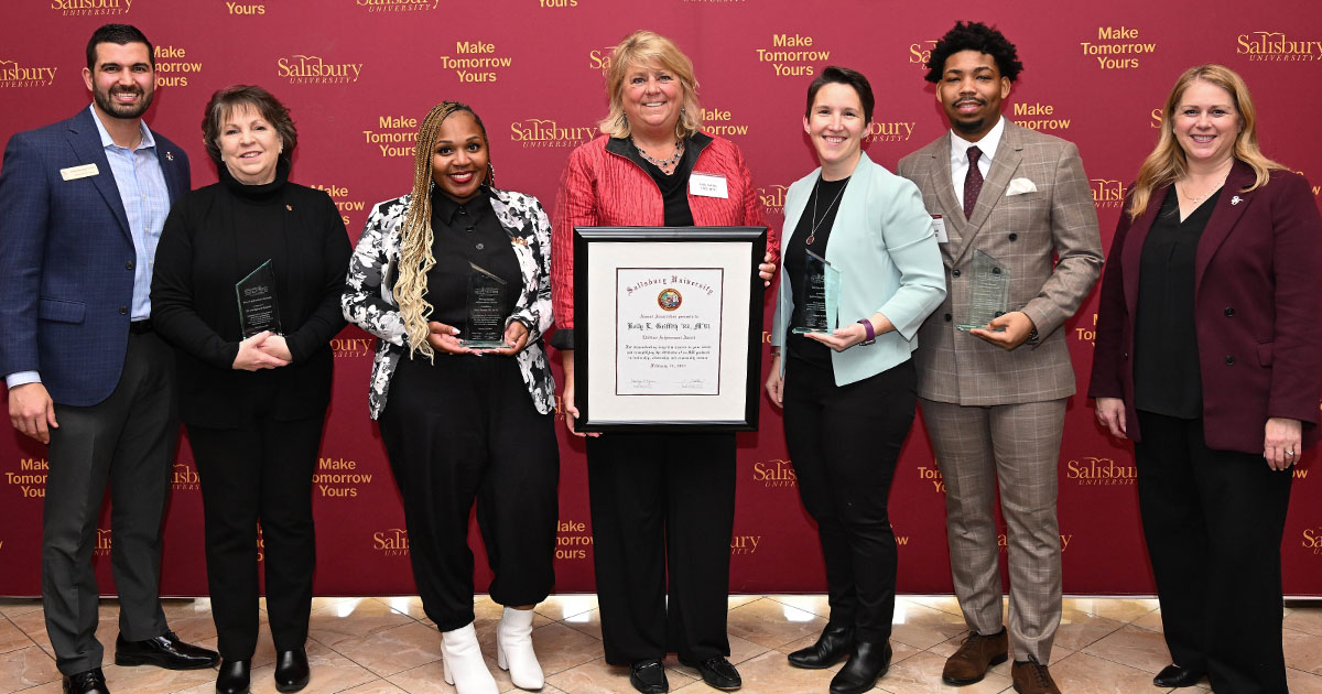 From left: Austin Whitehead, SU Alumni Association President; 2024 SU Alumni Association award recipients Michele Garigliano, Niya Brown, Kelly Griffith, Julia Glanz and Brian Anderson; and SU President Carolyn Ringer Lepre.